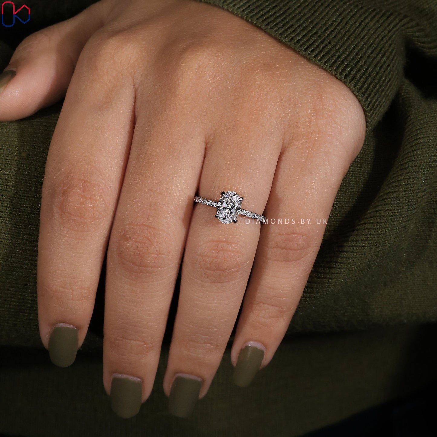 Oval Shaped Engagement Ring With Pave Setting