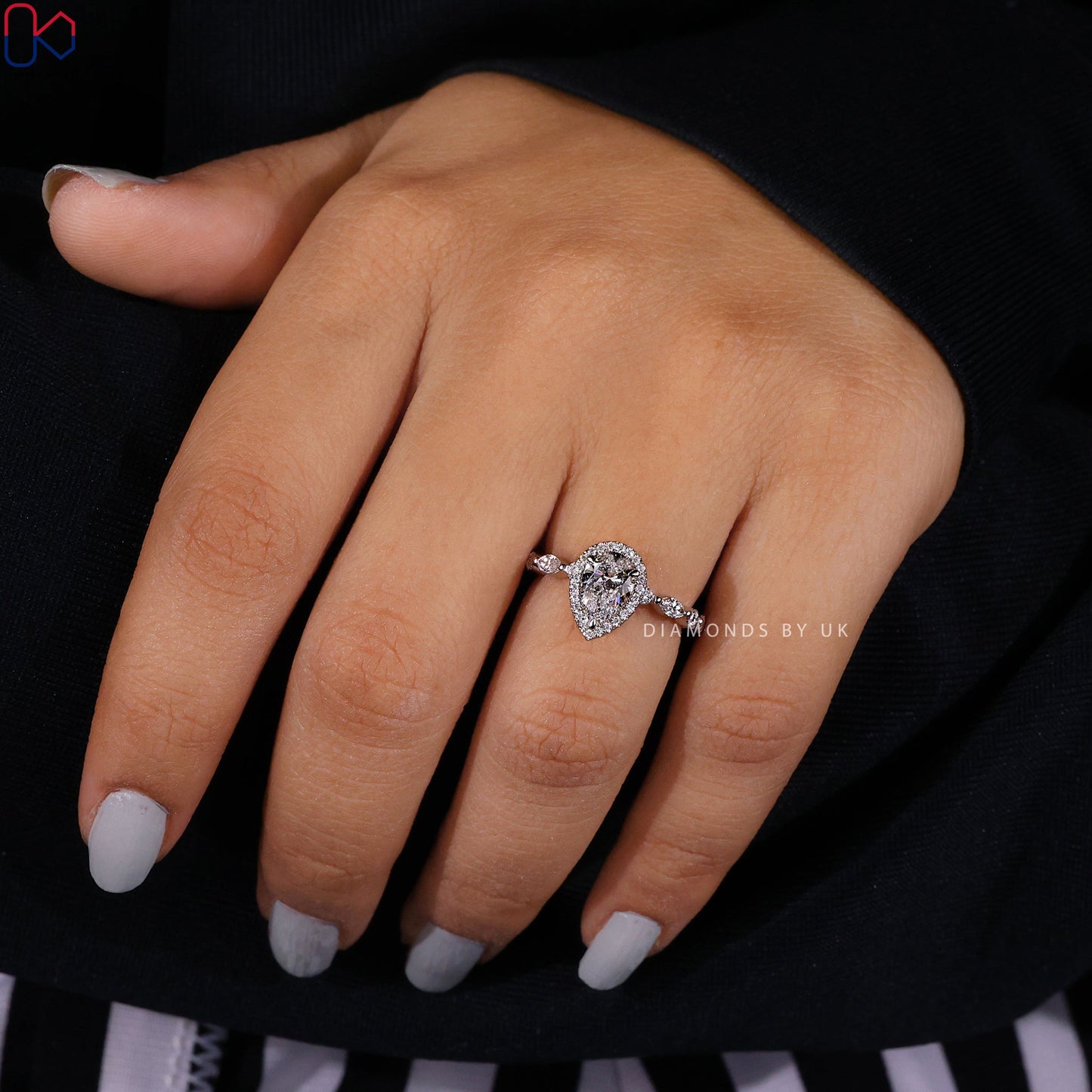 Pear Shape Engagement Ring With Floating Bubble Prong