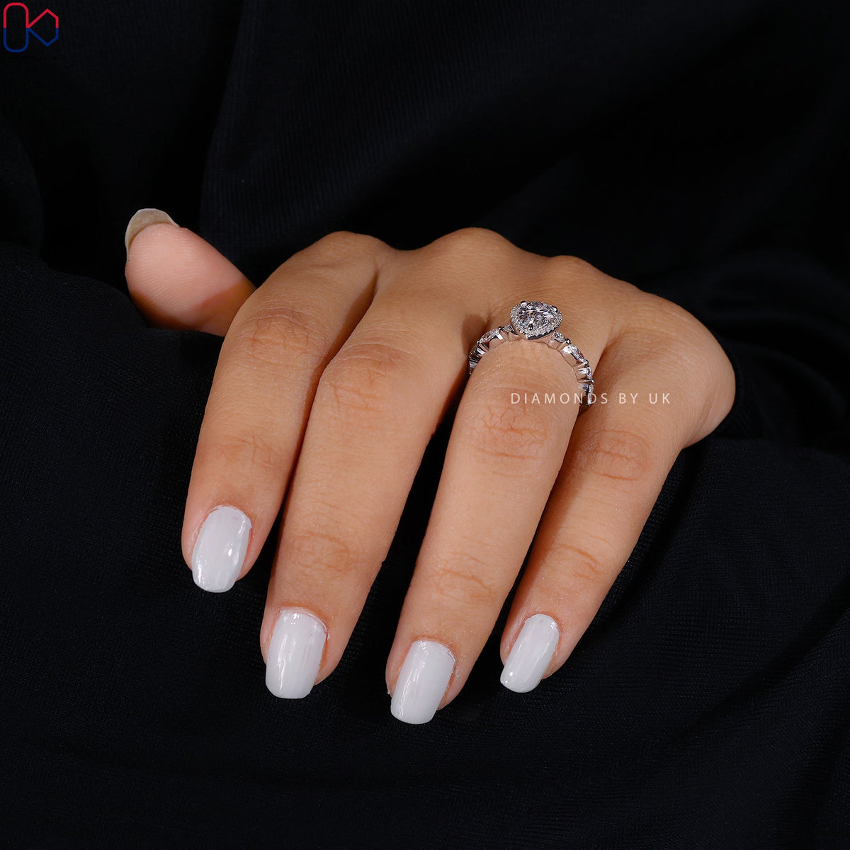 Pear Shape Engagement Ring With Floating Bubble Prong