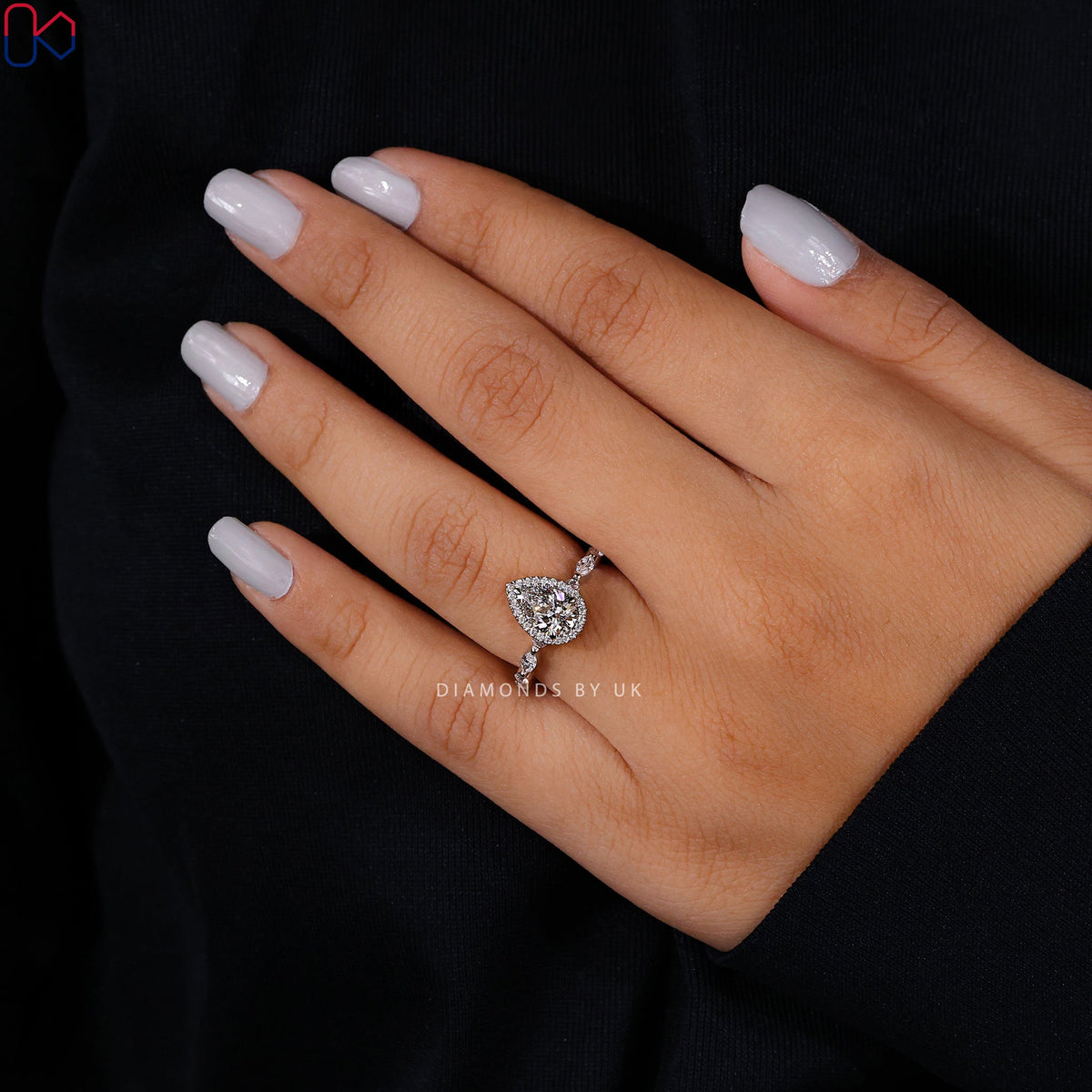 Pear Shape Engagement Ring With Floating Bubble Prong