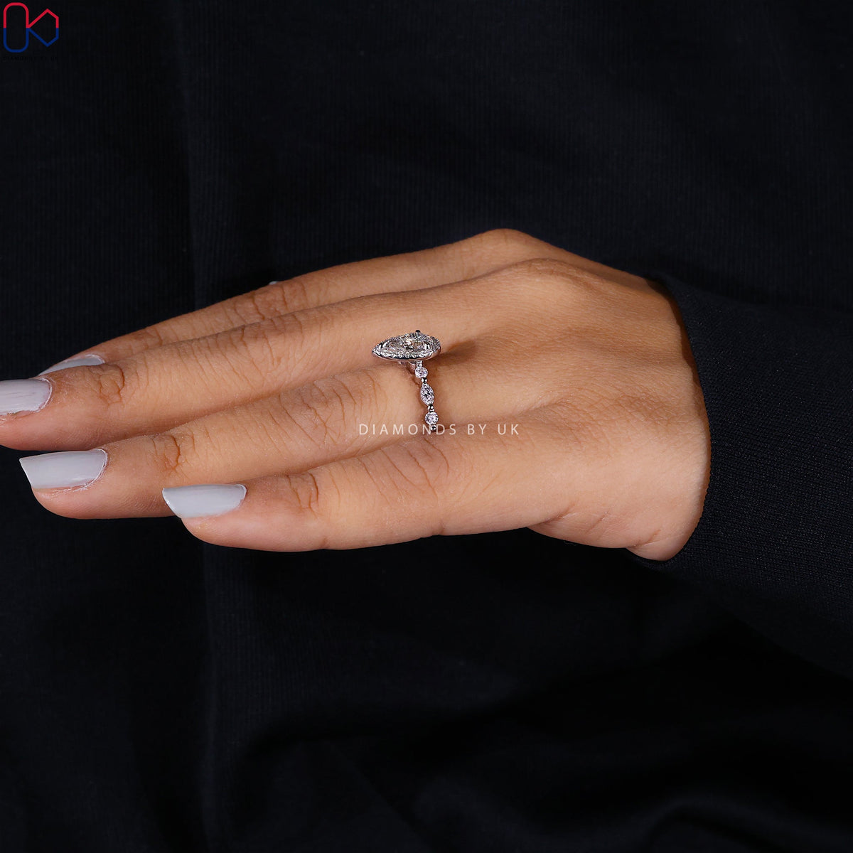 Pear Shape Engagement Ring With Floating Bubble Prong