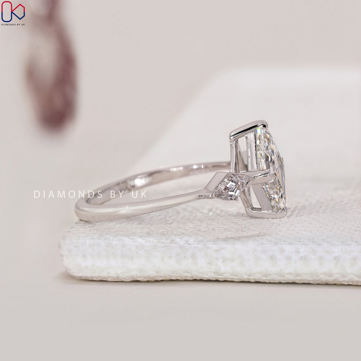Lozenge Cut Diamond Ring With Kite Side Stones