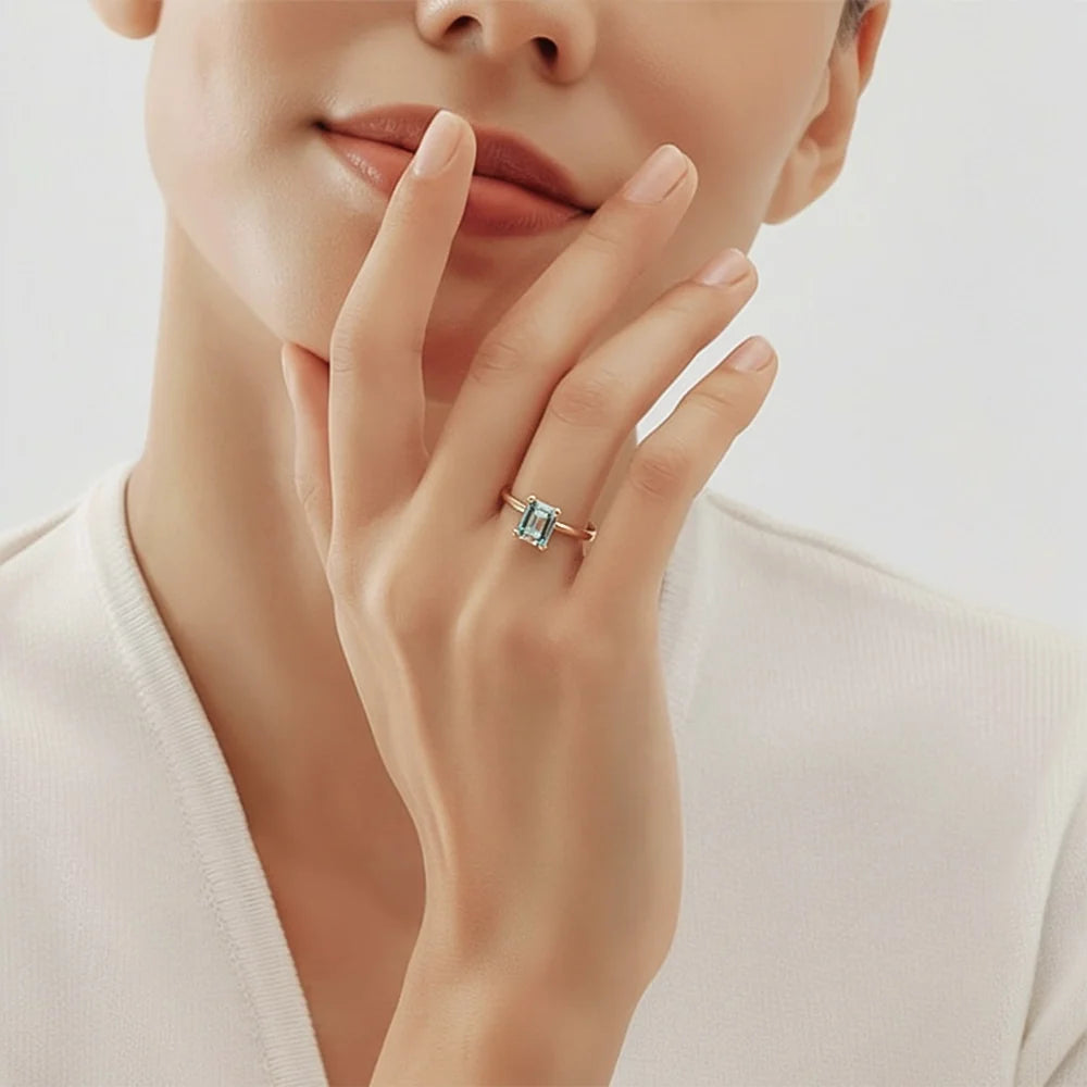 Gaia’s Solace | Emerald Cut Green Tourmaline Solitaire Engagement Ring