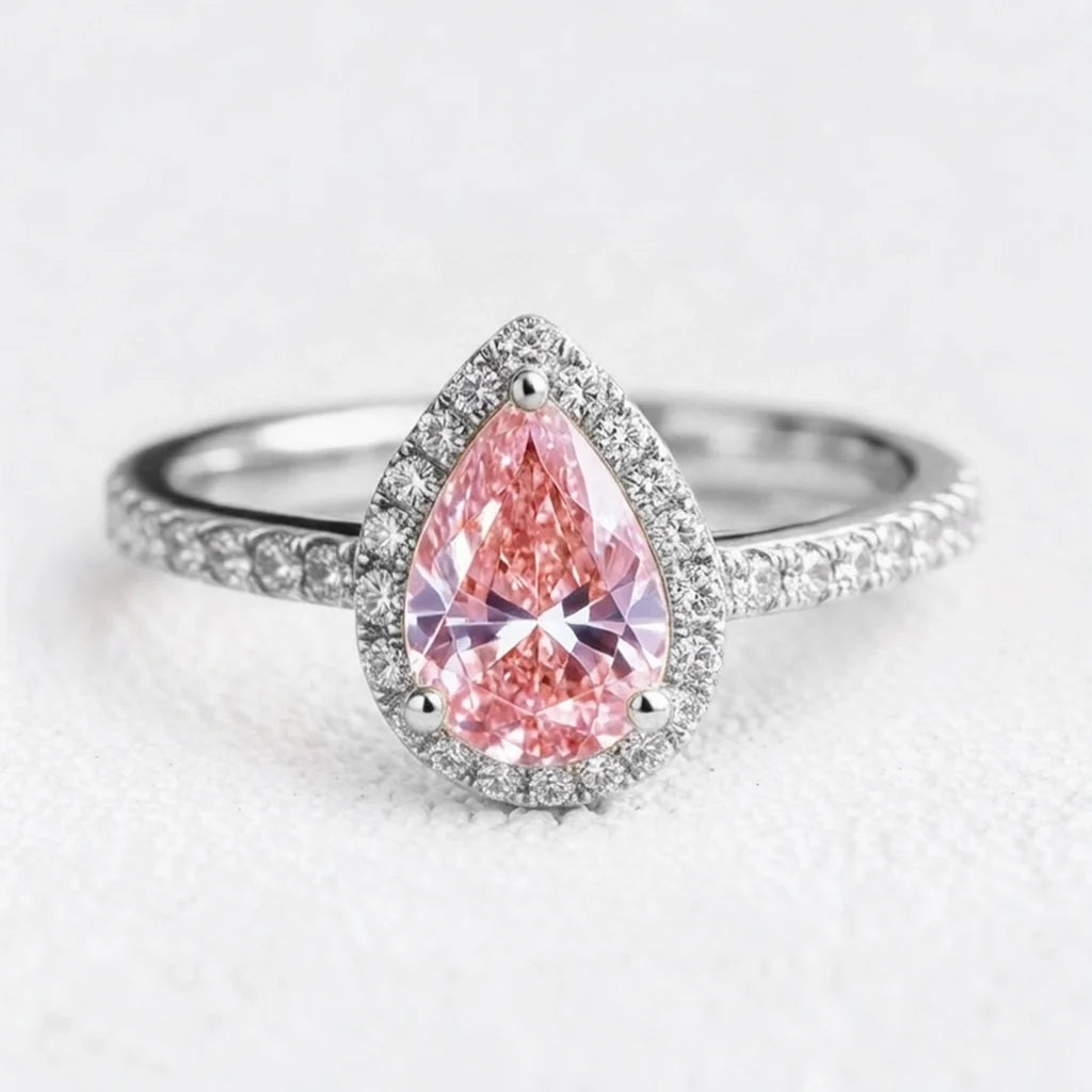 Stella’s Spark | 3CT Pear Cut Pink Sapphire Engagement Ring