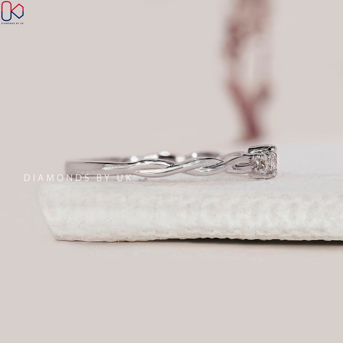 3 Stone Round Diamond Ring With Twist Shank