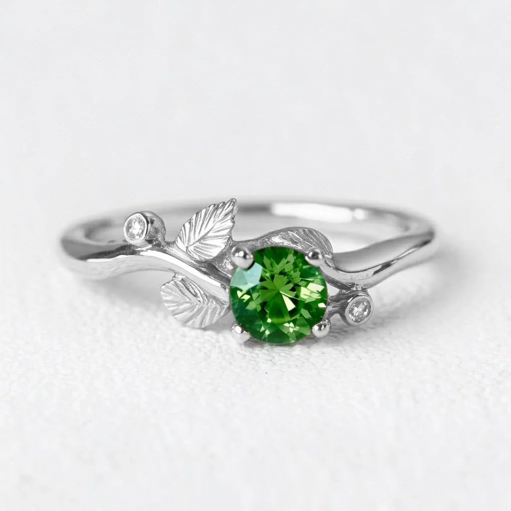 Ariadne’s Twine | Round Natural Emerald & Organic Vine Ring
