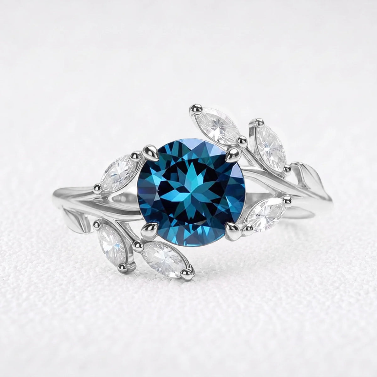 Eleonora’s Radiance | Round Blue Sapphire Vine Engagement Ring