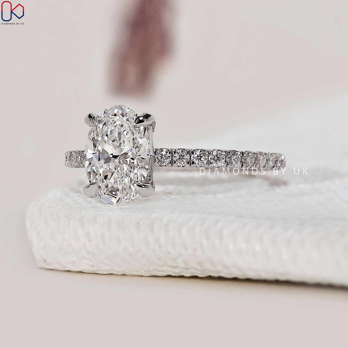 Oval Shaped Engagement Ring With Pave Setting