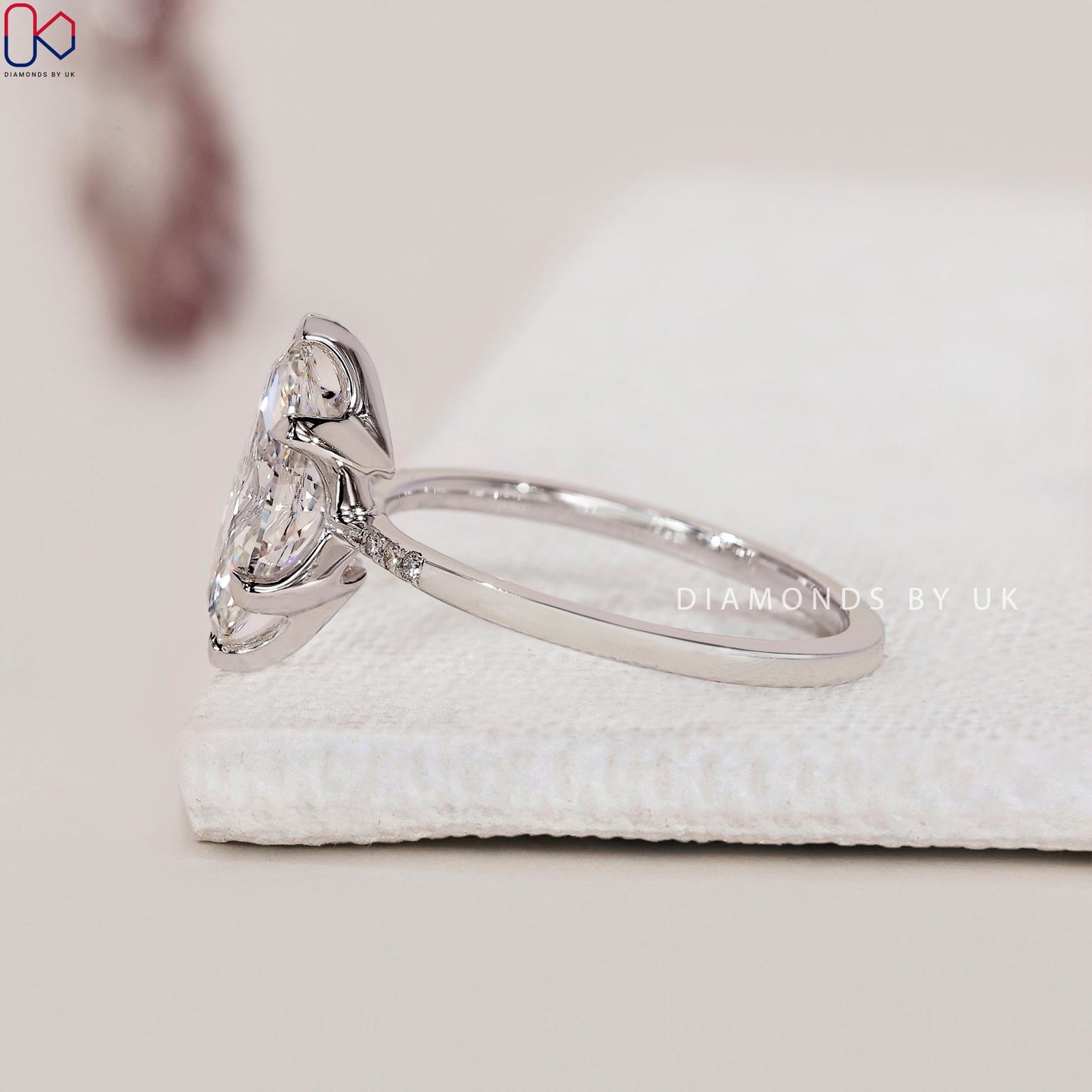 Marquise Diamond Engagement Ring with Round Side Accents