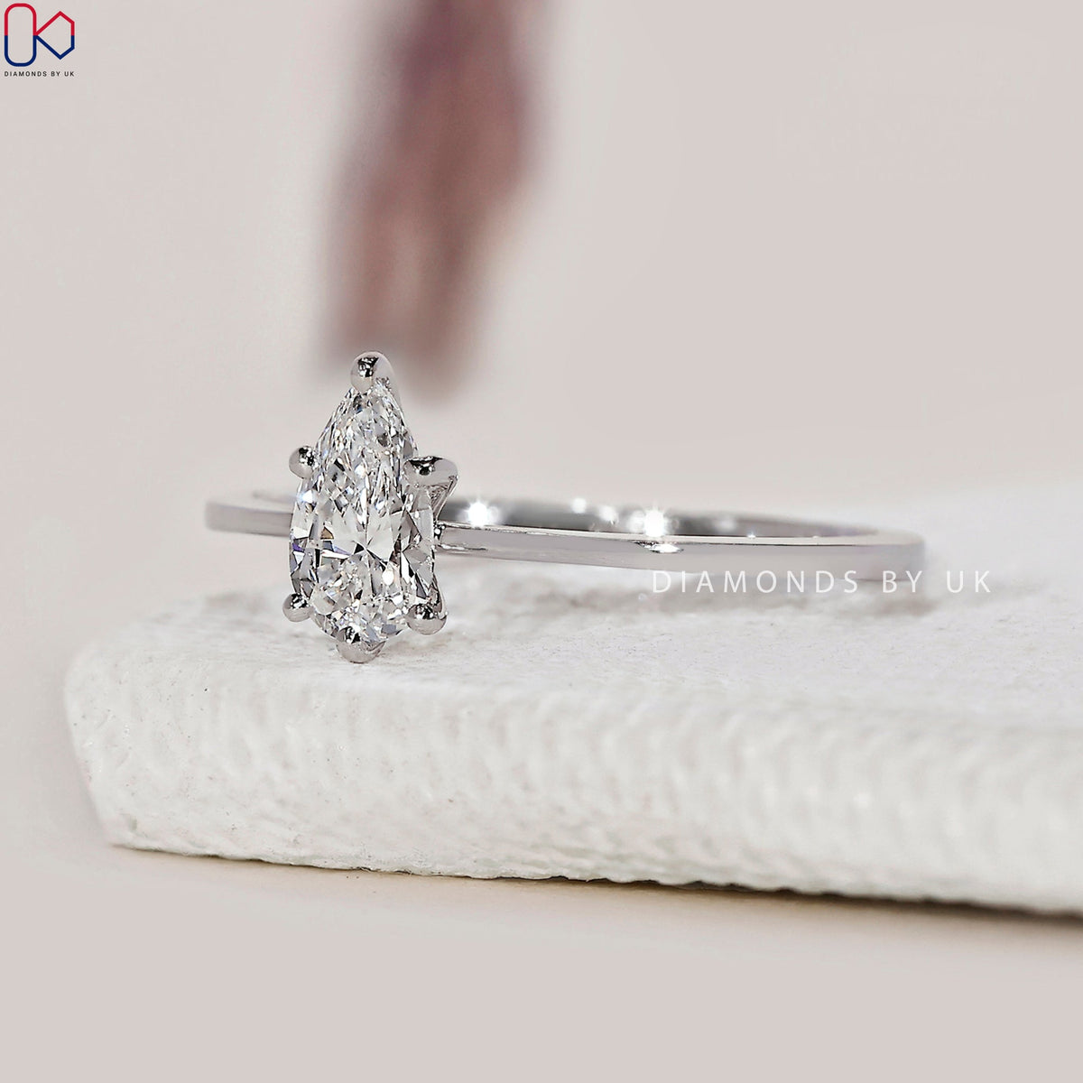 Solitaire Pear Shaped Diamond Ring In White Gold