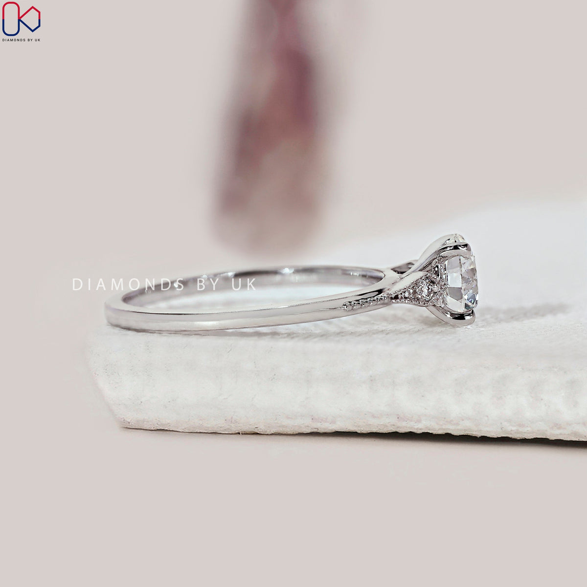 Round Diamond Side Stone Engagement Ring