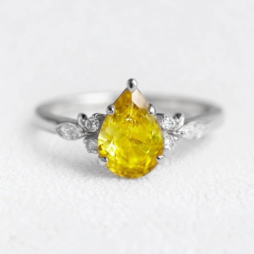 Seraphina’s Amber | Pear Yellow Sapphire Engagement Ring