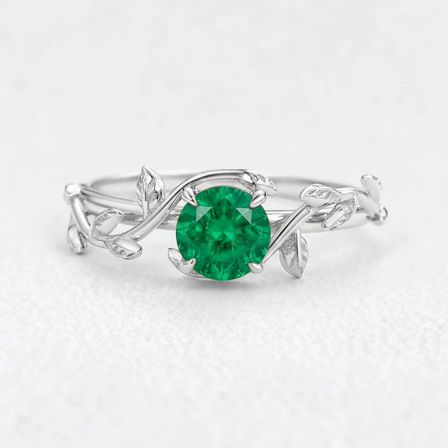 Isadora’s Eden | Round Emerald Foliage Engagement Ring