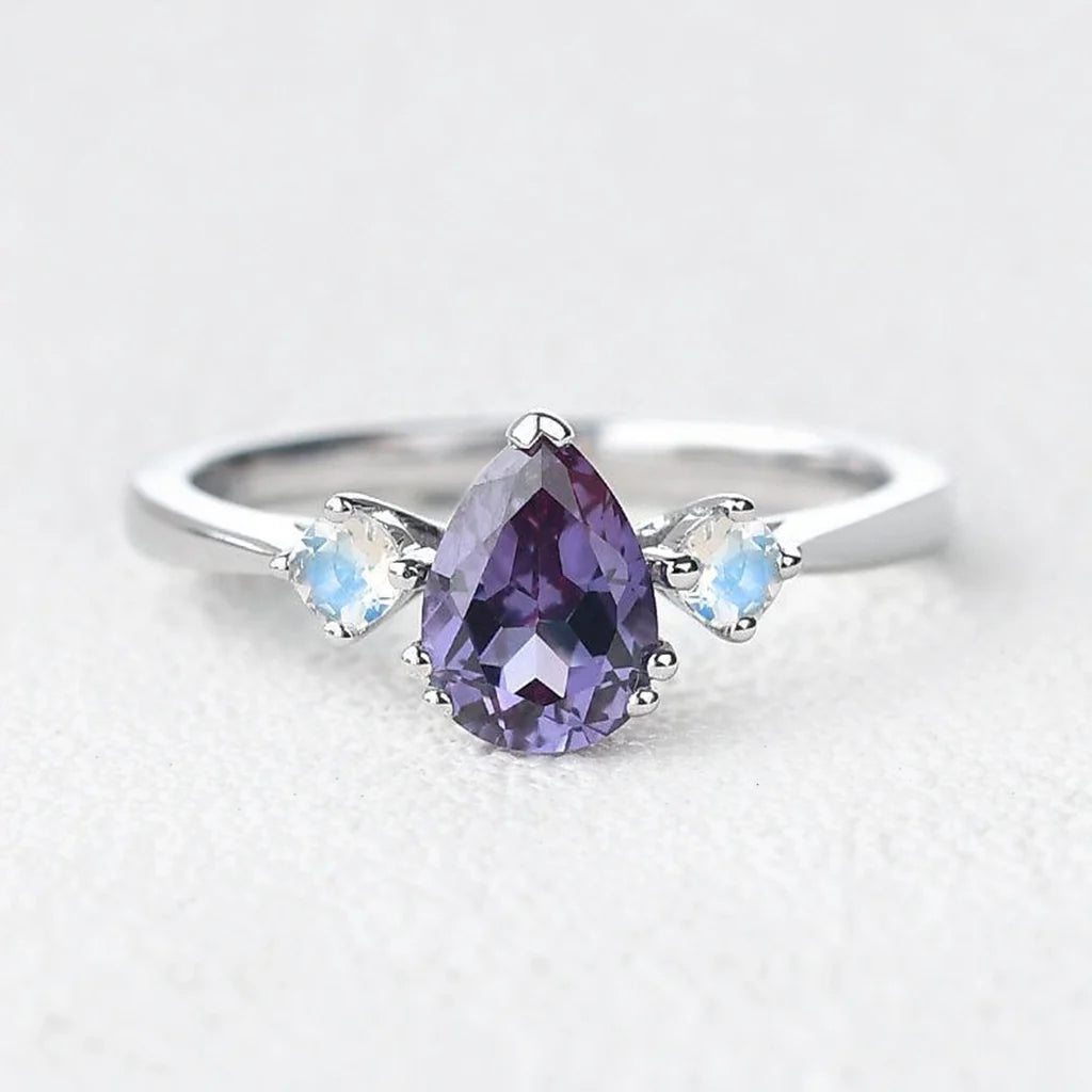 Selene’s Mirage | Pear Tanzanite & Moonstone Engagement Ring