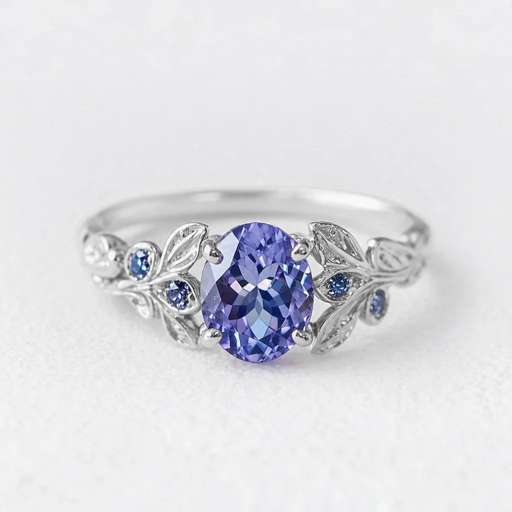 Aria‘s Glade | 1.5CT Oval Cut Tanzanite & Blue Sapphire Leaf Engagement Ring