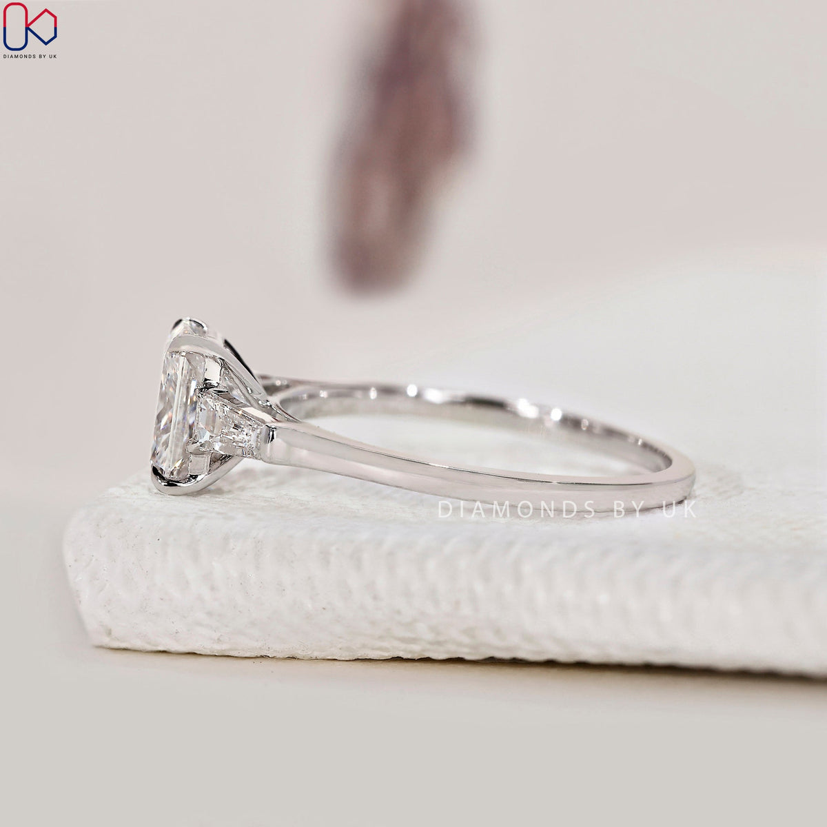 Radiant Cut Diamond Ring With Tapered Baguette Side Stone