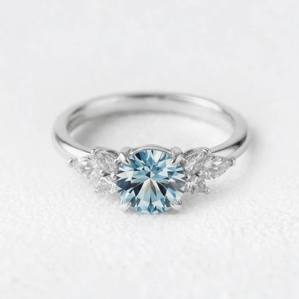 Selene’s Whisper | 1CT Round Cut Blue Sapphire Cluster Engagement Ring