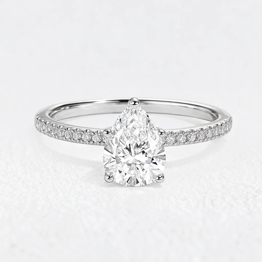 Lena’s Radiance | 1.5CT Pear Diamond Pavé Solitaire Engagement Ring