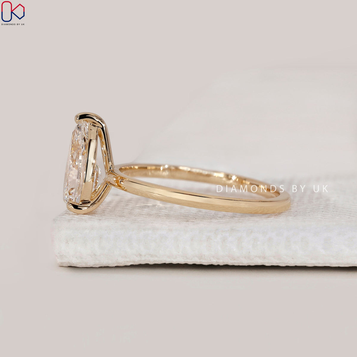 Yellow Gold Pear Solitaire Engagement Ring