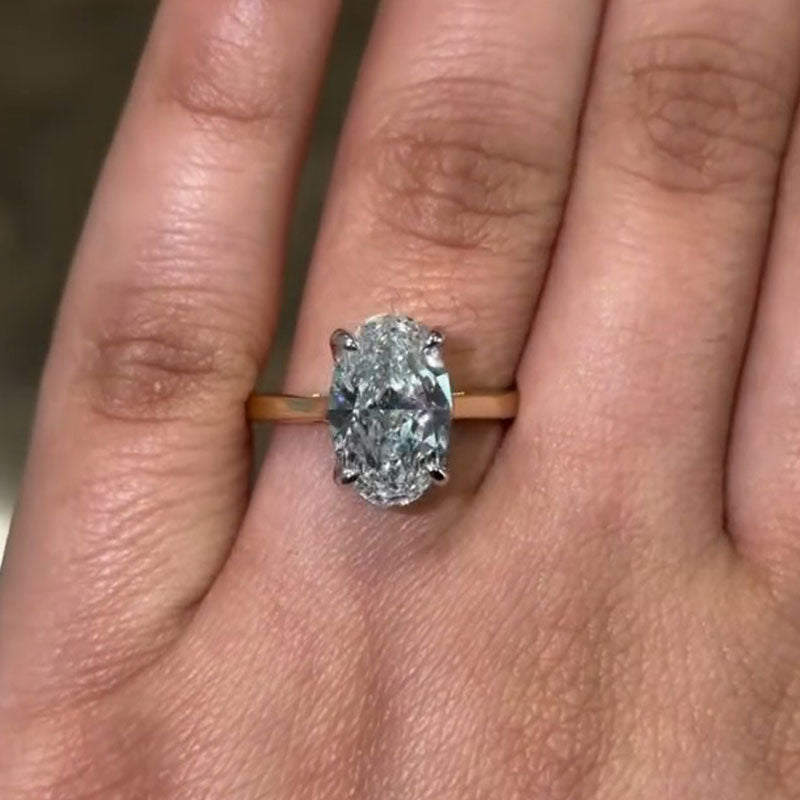 Elegant Golden Tone Oval Cut Sterling Silver Engagement Ring With Hidden Halo