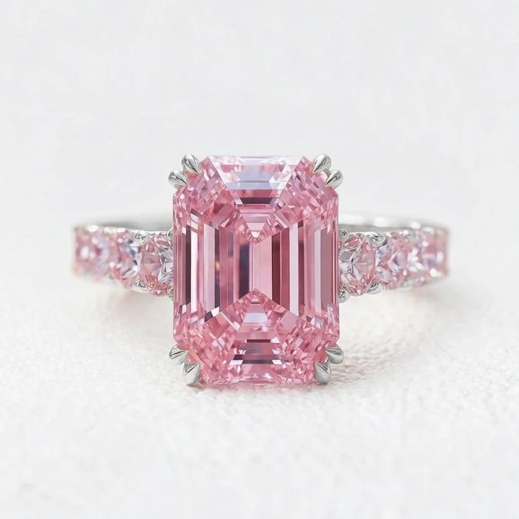 Aurora’s Aureole | 3CT Emerald Cut Pink Sapphire Engagement Ring