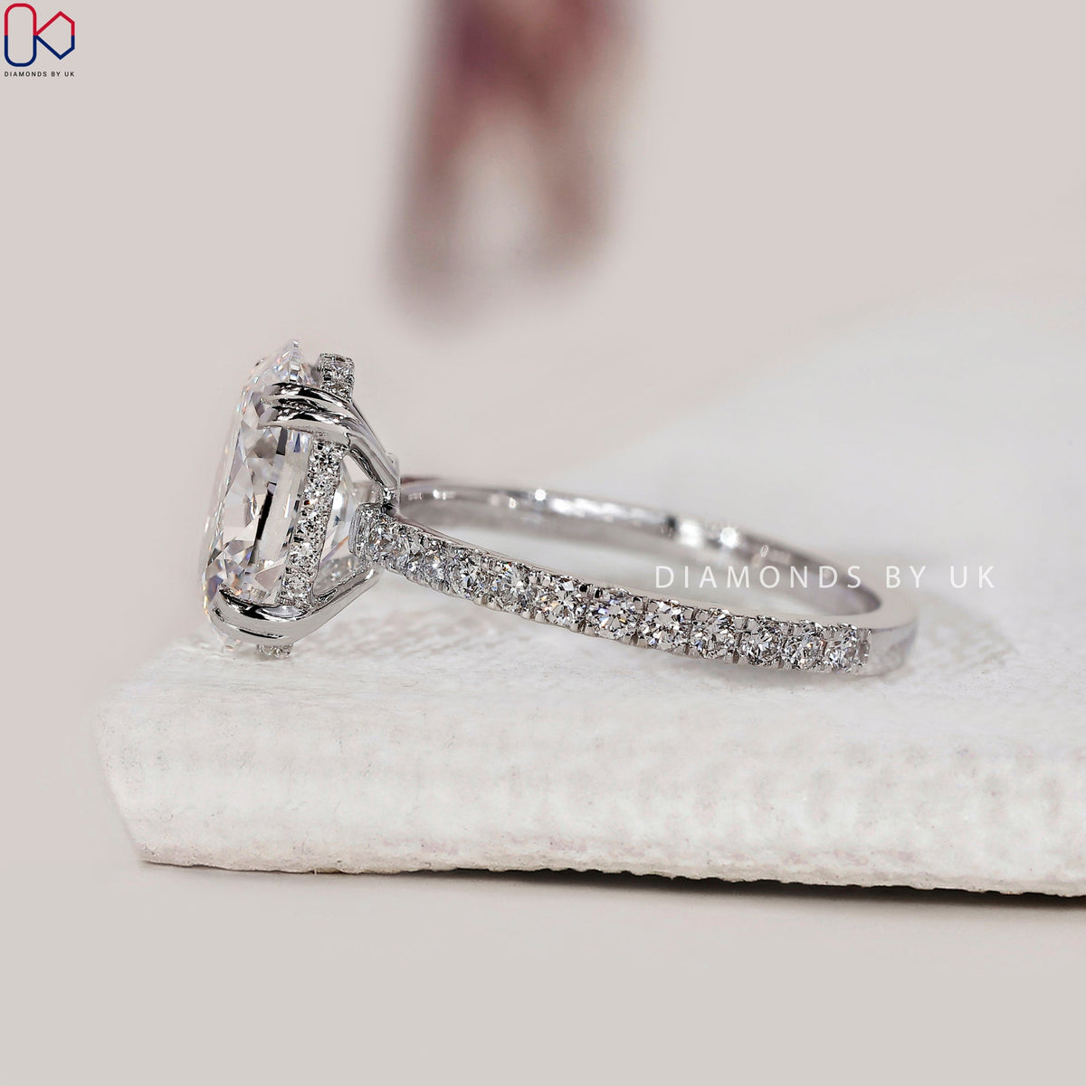 Oval Cut Diamond Ring In Pave Setting