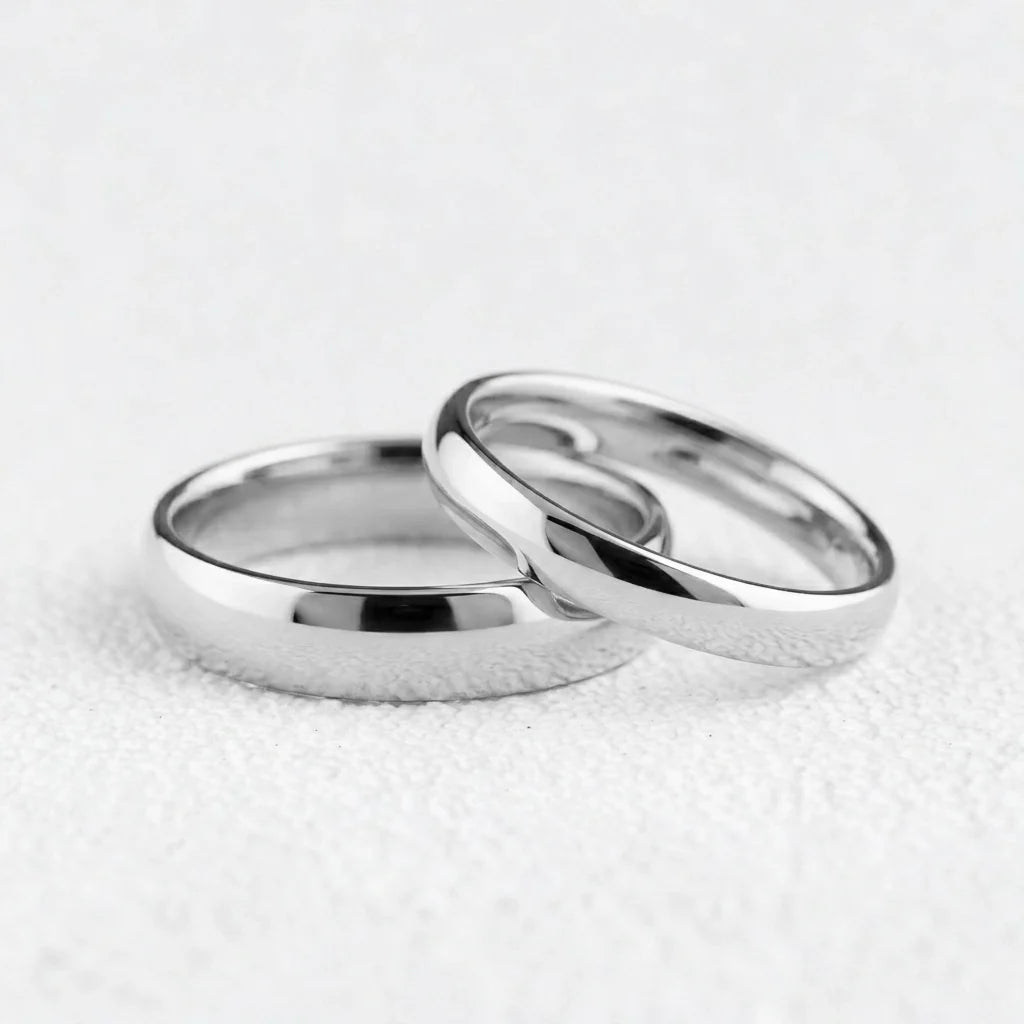 The Mirrored Pair – Polished Arc Wedding Bands in Solid Gold