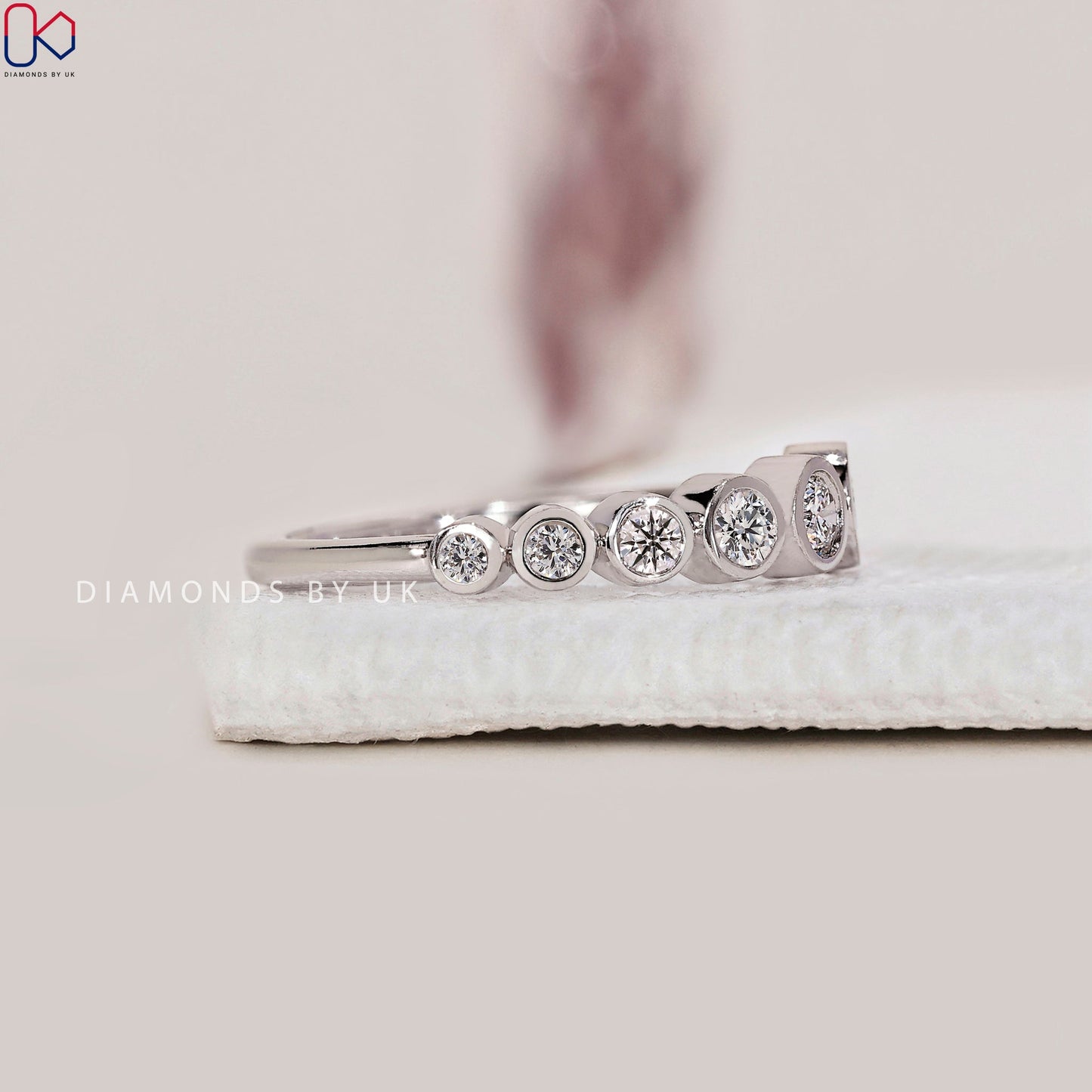Round Cut White Gold Bezel Set Wedding Band