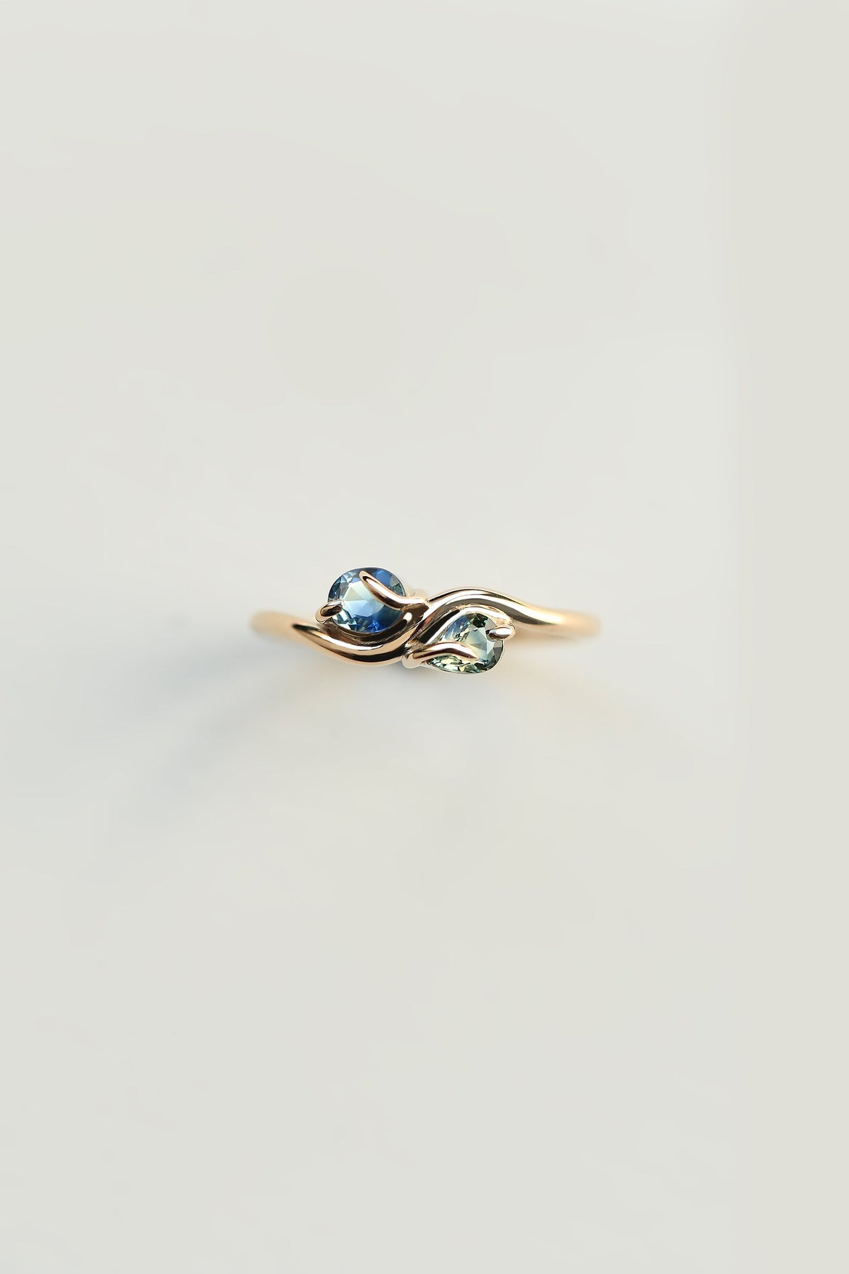 PAIRED OVAL AND PEAR CUT SAPPHIRE RING