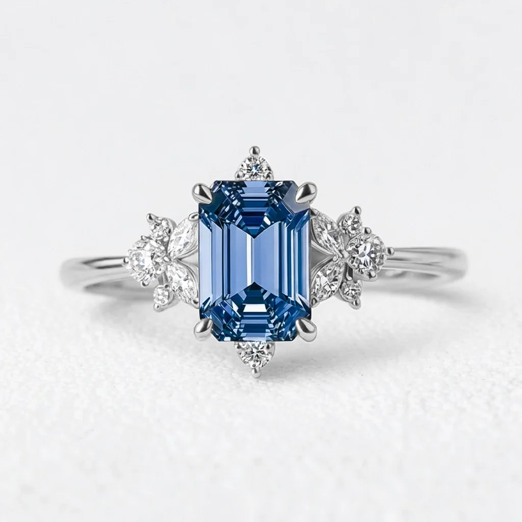 Lyra’s Cadence | 2CT Vintage Emerald Cut Blue Sapphire Ring