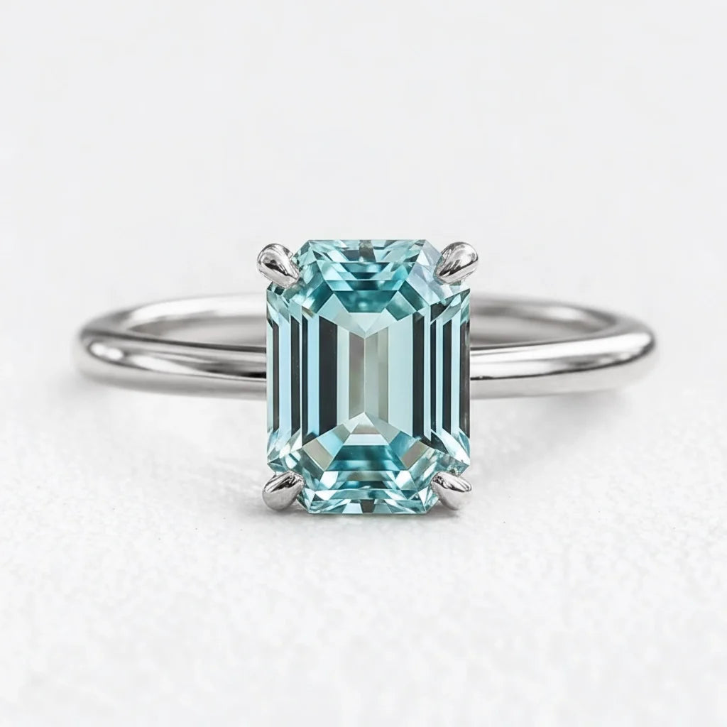 Celia’s Lodestar | 3CT Emerald Cut Aqua Sapphire Solitaire Engagement Ring