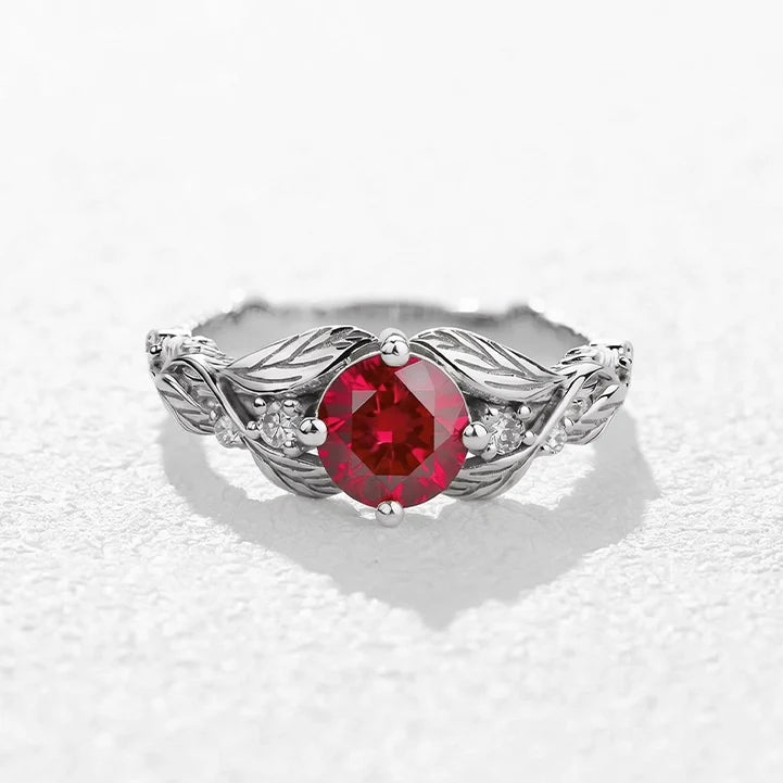 Rosalind’s Olive | Round Ruby Solitaire Ring with Olive Leaf Diamond Accents