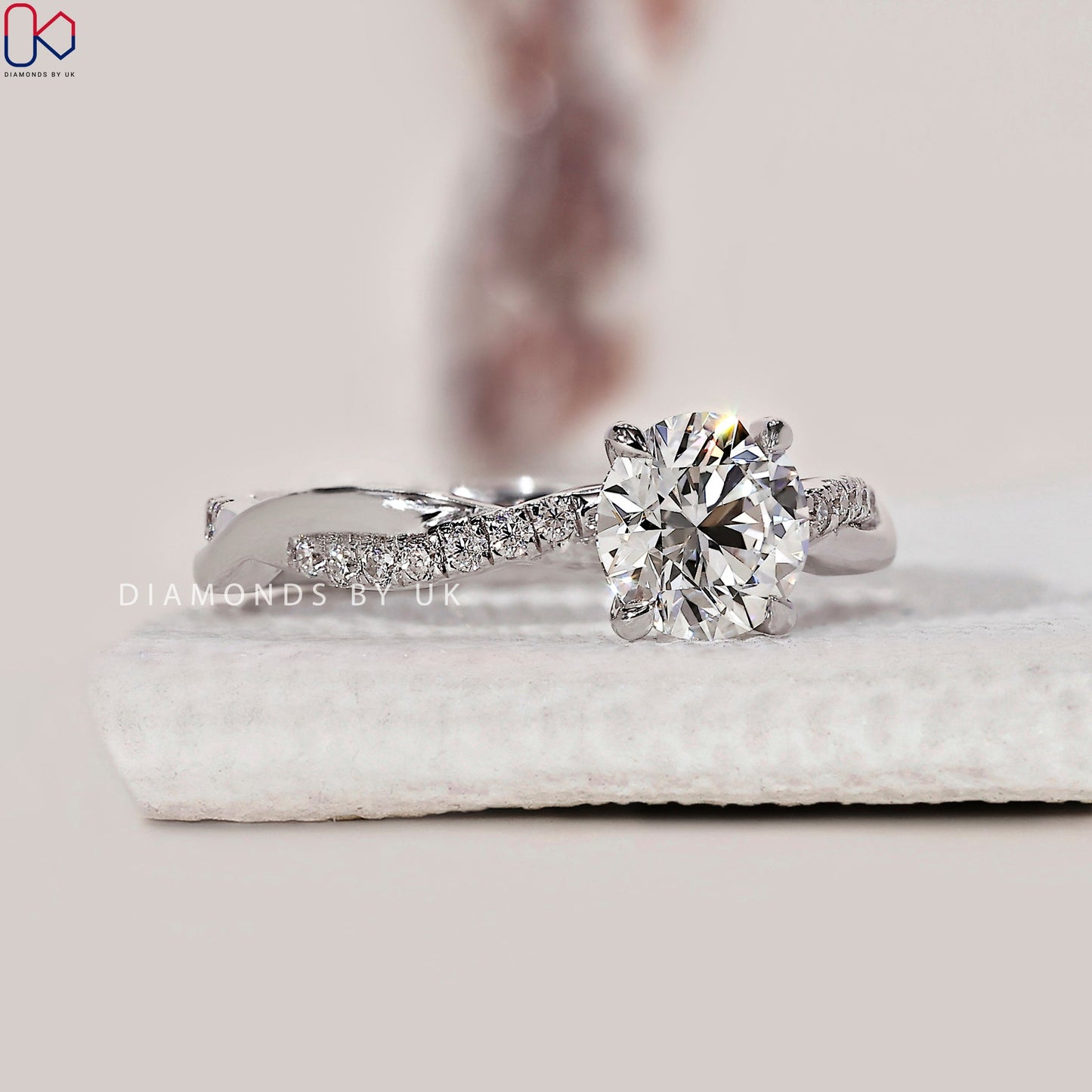 Round Cut Diamond Ring With Twisted Pave Setting