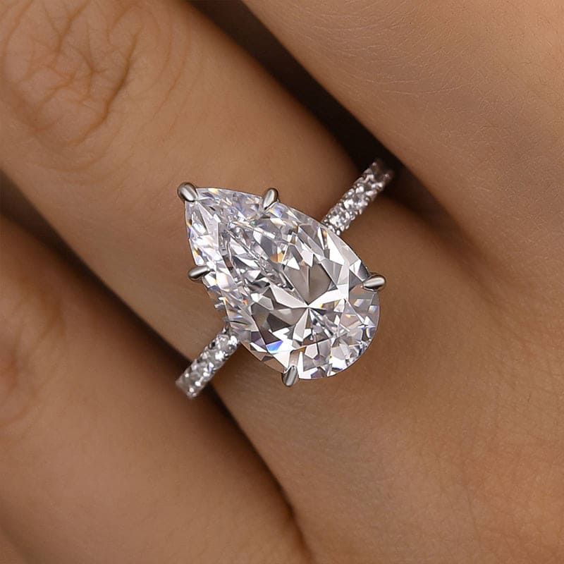 Hidden Halo Pear Cut 4.5ct Engagement Ring In Sterling Silver