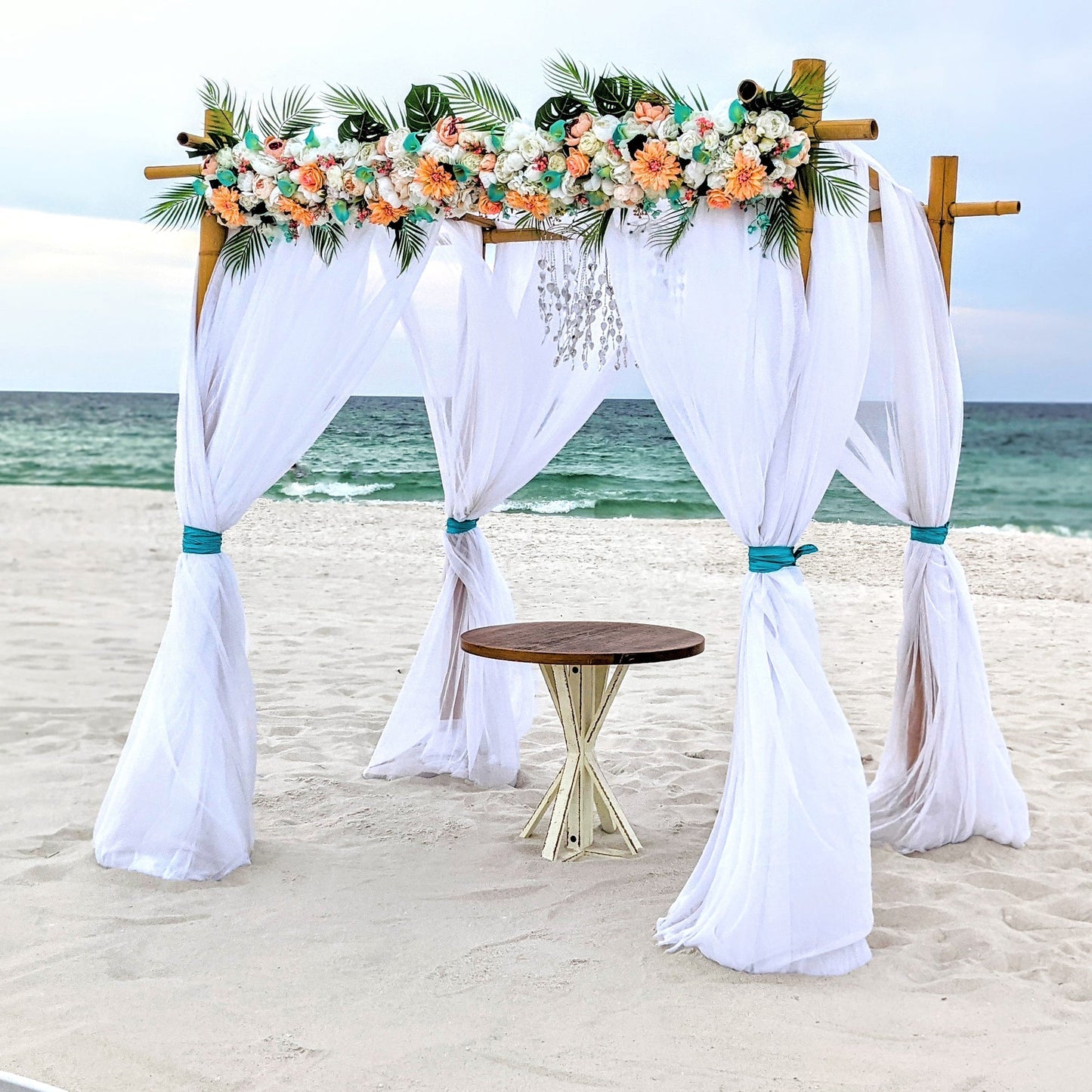 A Stunning Day Wedding Ceremony Package (Officiant, Photographer, Decor with Seating)