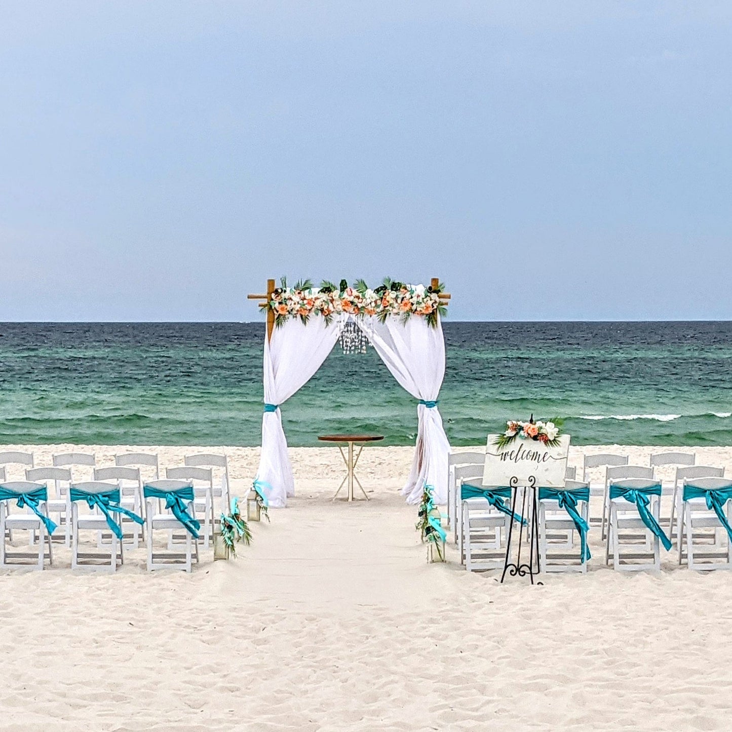 A Stunning Day Wedding Ceremony Package (Officiant, Photographer, Decor with Seating)
