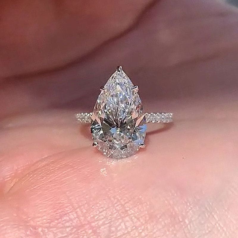 Hidden Halo Pear Cut 4.5ct Engagement Ring In Sterling Silver