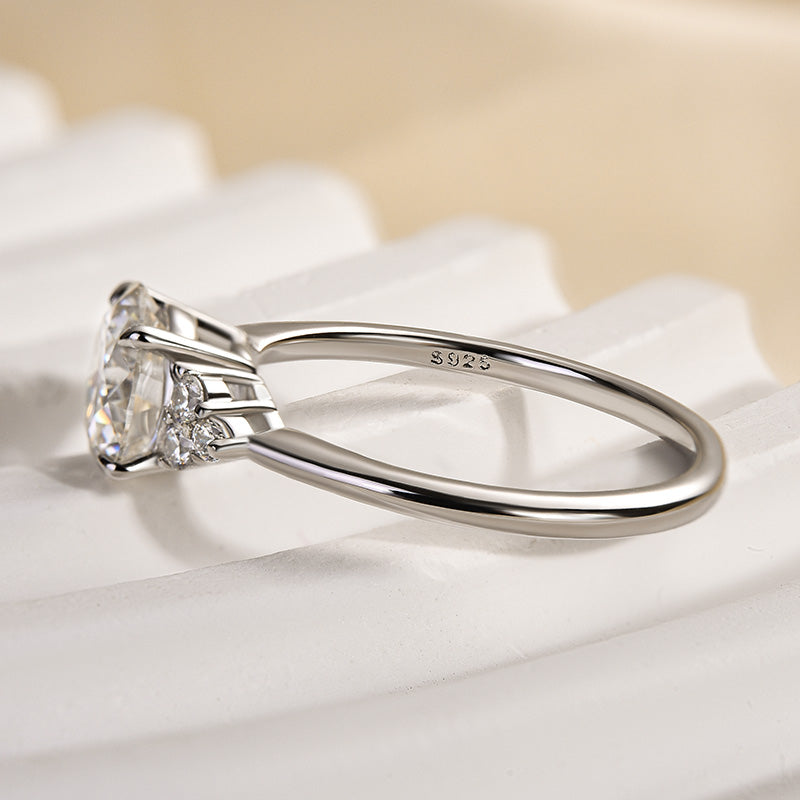 Ornate Solarii Moissanite 1.2ct Round Cut 925 Sterling Silver Side Stone Engagement Ring