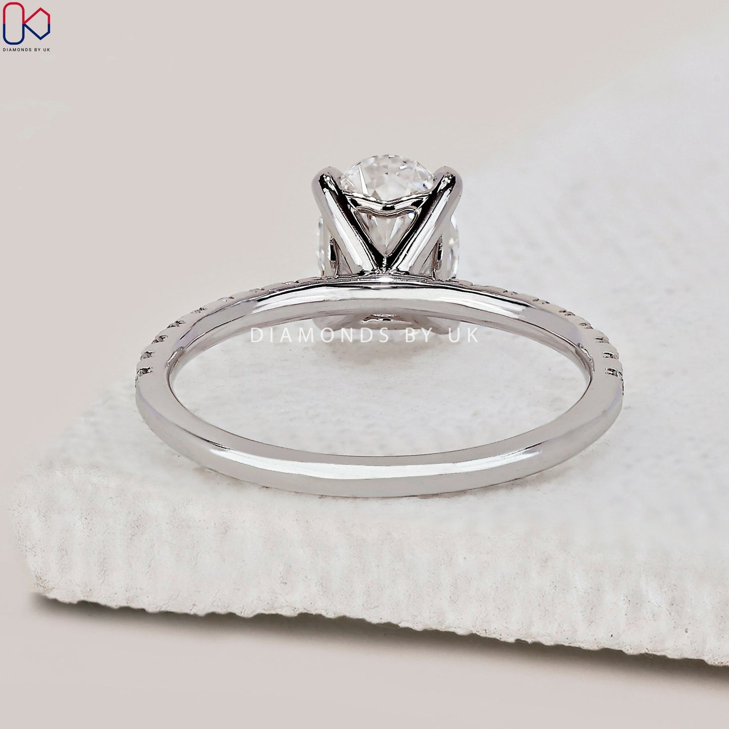 Oval Shaped Engagement Ring With Pave Setting