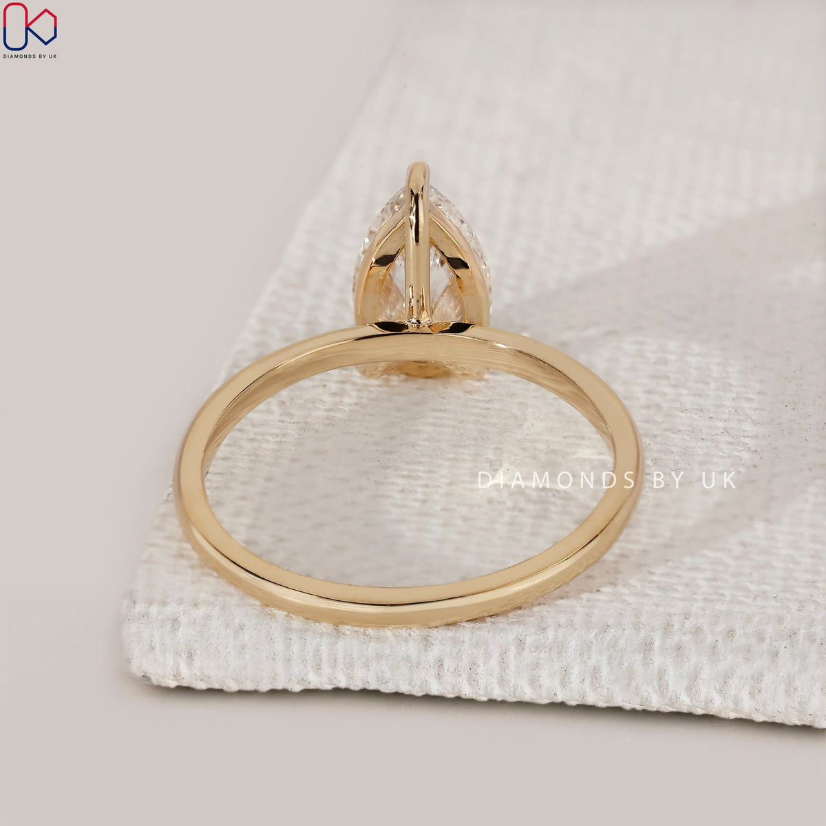 Yellow Gold Pear Solitaire Engagement Ring