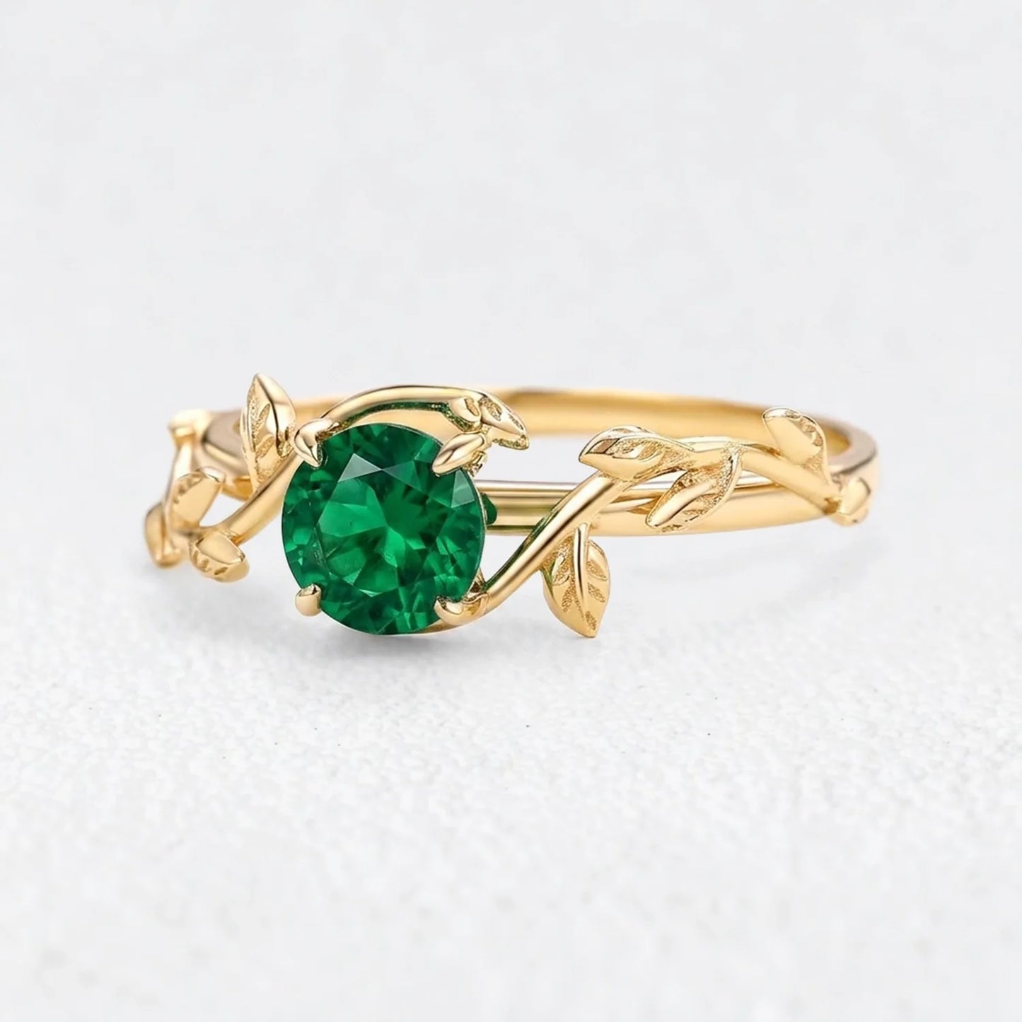 Isadora’s Eden | Round Emerald Foliage Engagement Ring