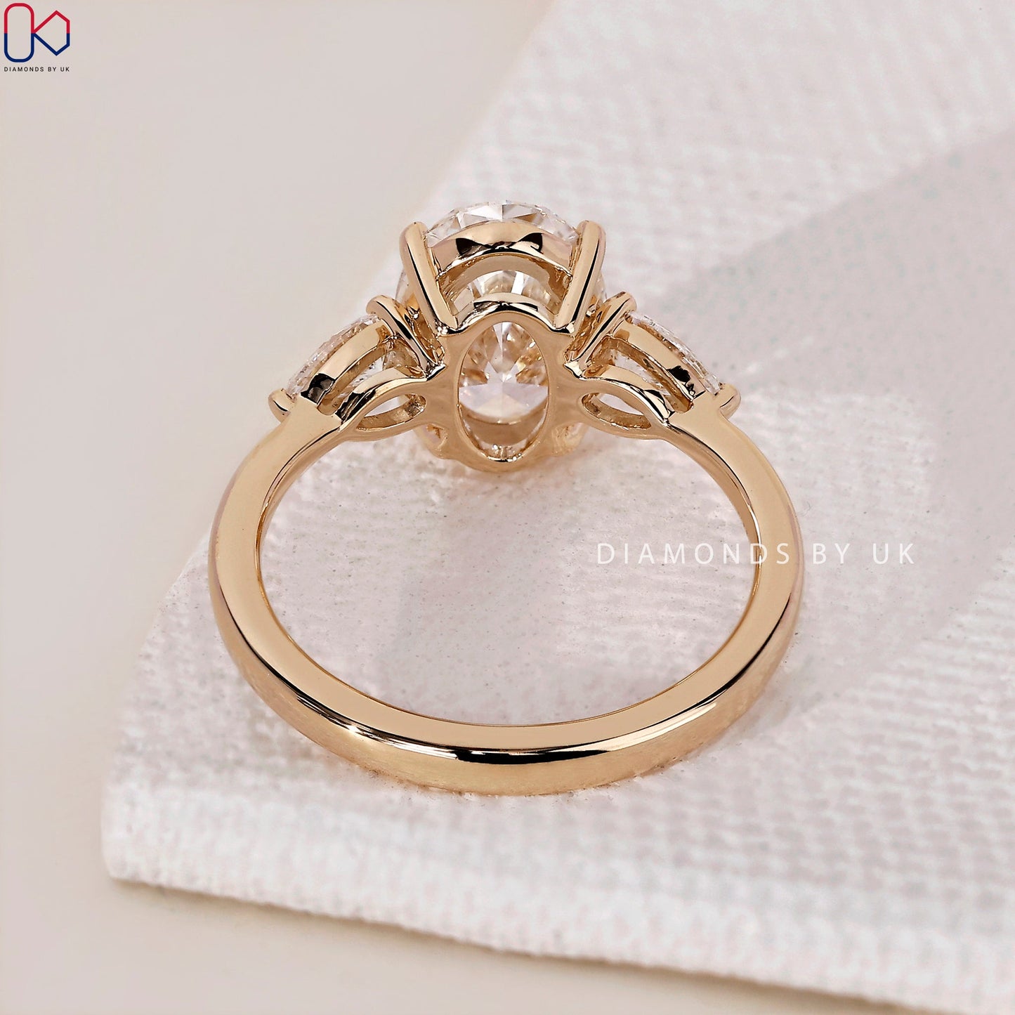 3 Stone Engagement Ring - Oval and Pear Diamond