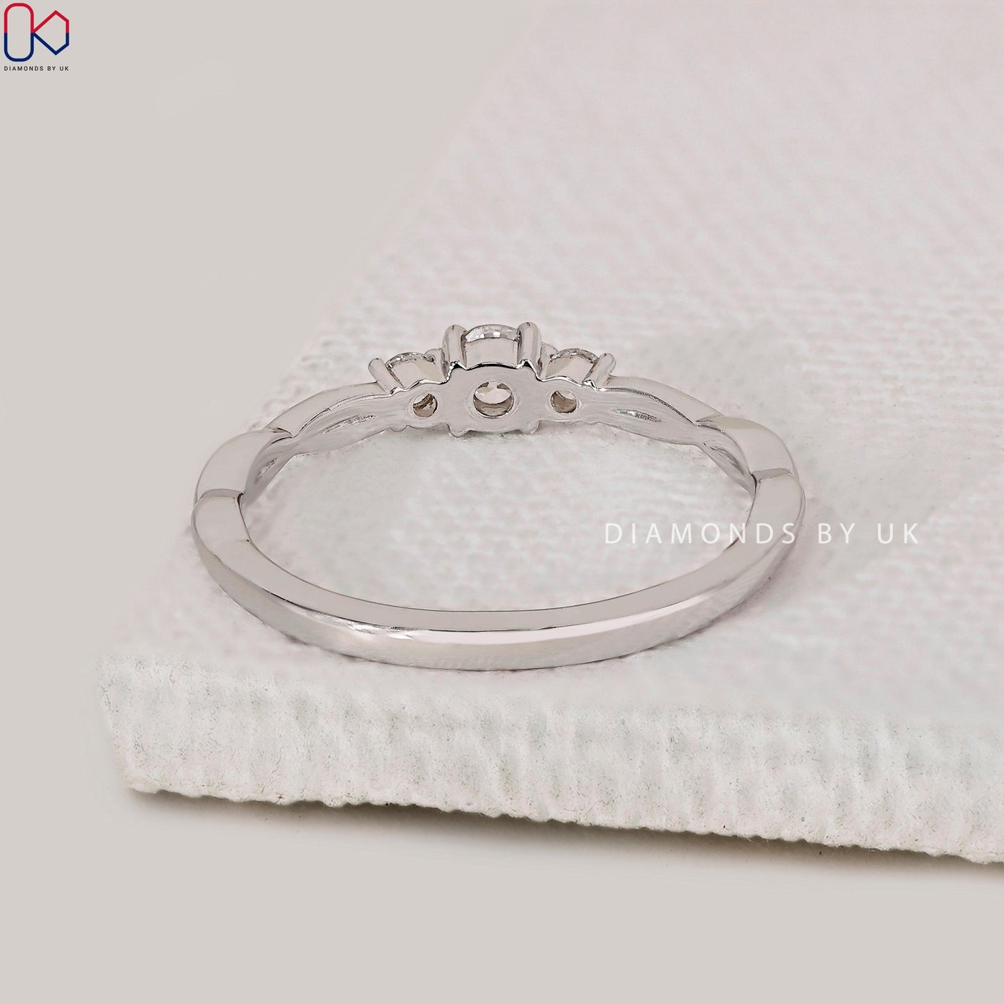 3 Stone Round Diamond Ring With Twist Shank