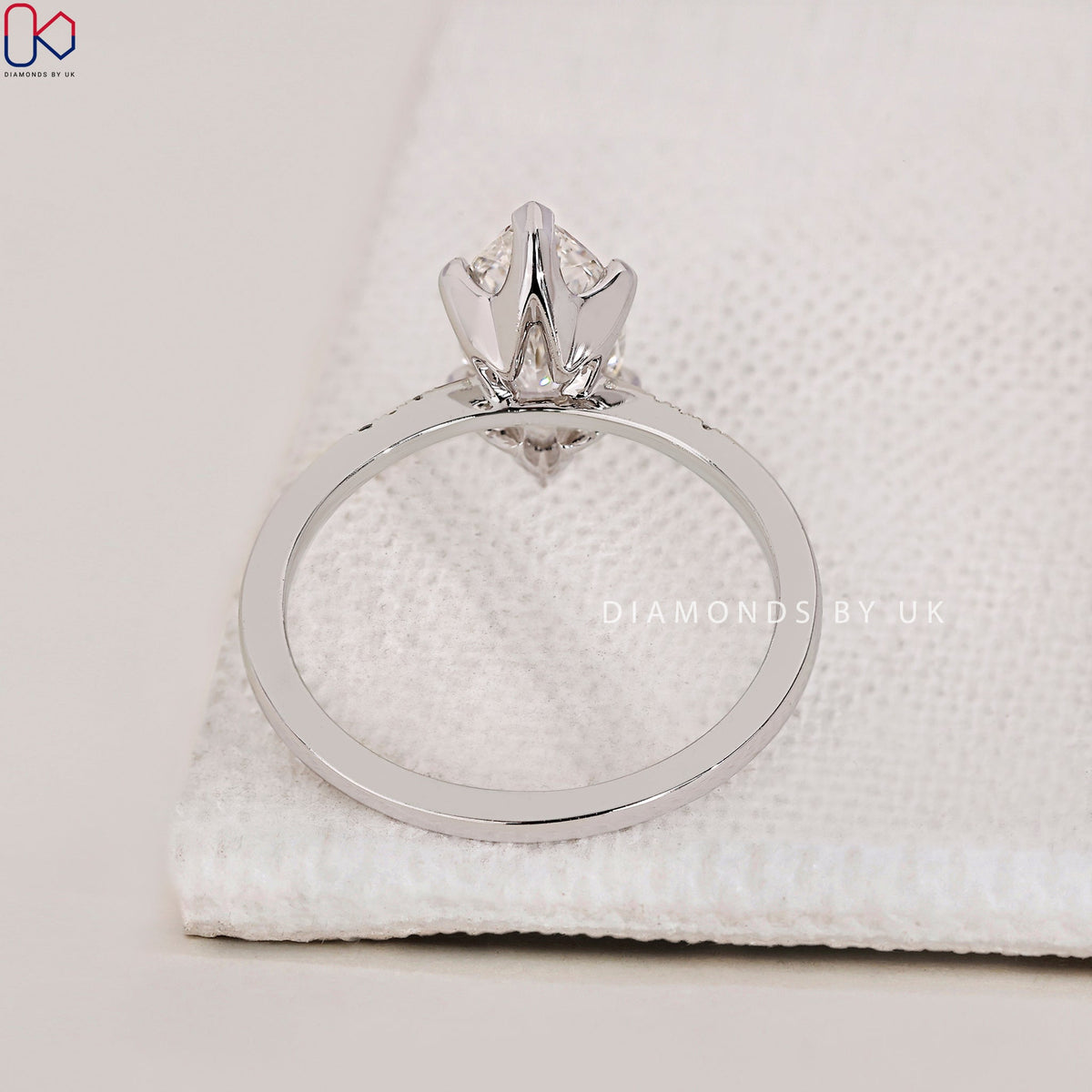 Marquise Diamond Engagement Ring with Round Side Accents