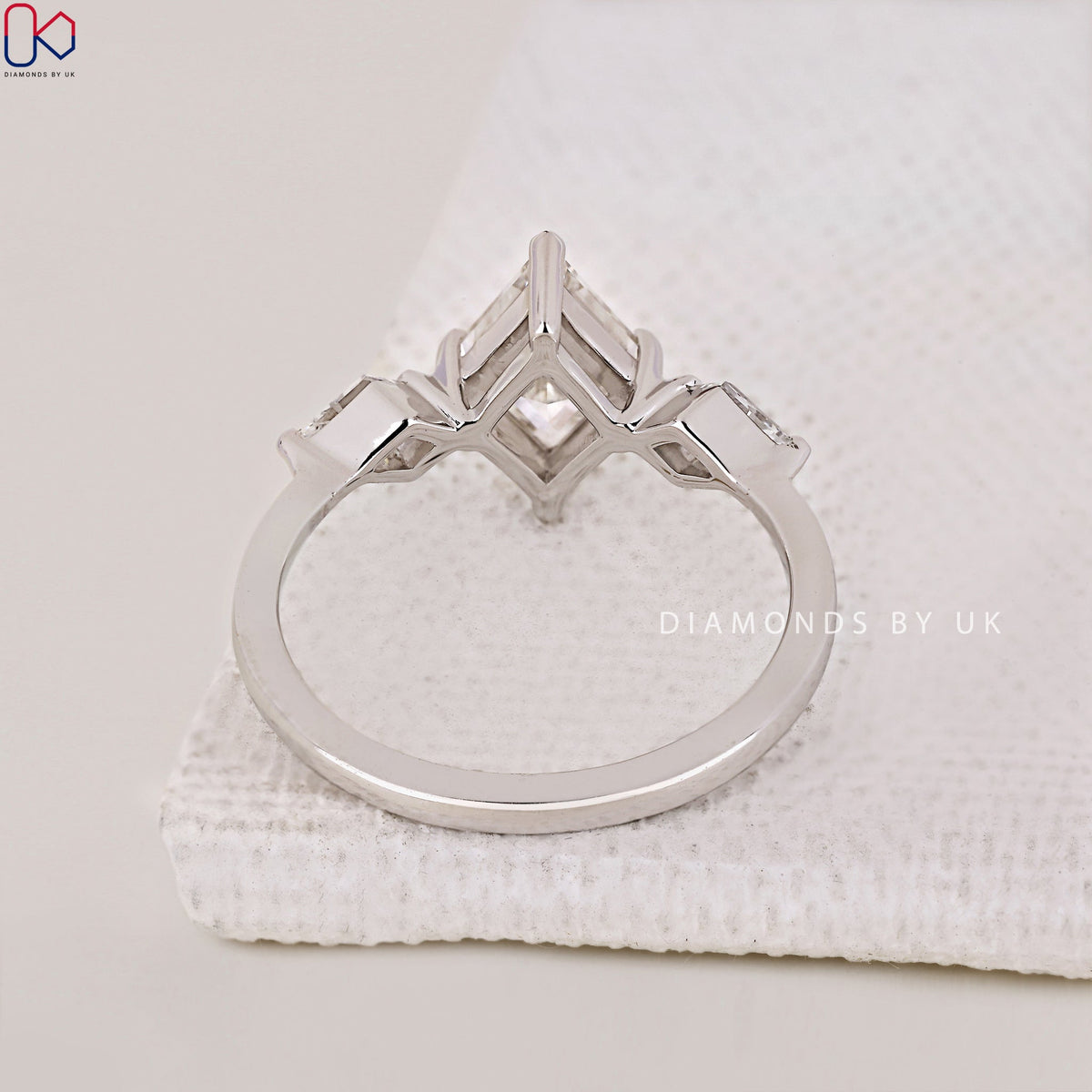 Lozenge Cut Diamond Ring With Kite Side Stones