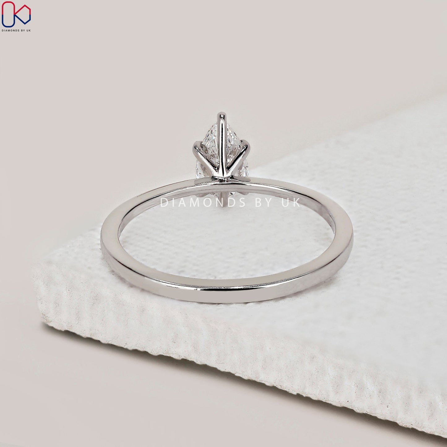 Solitaire Pear Shaped Diamond Ring In White Gold