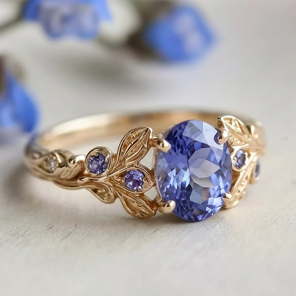 Aria‘s Glade | 1.5CT Oval Cut Tanzanite & Blue Sapphire Leaf Engagement Ring