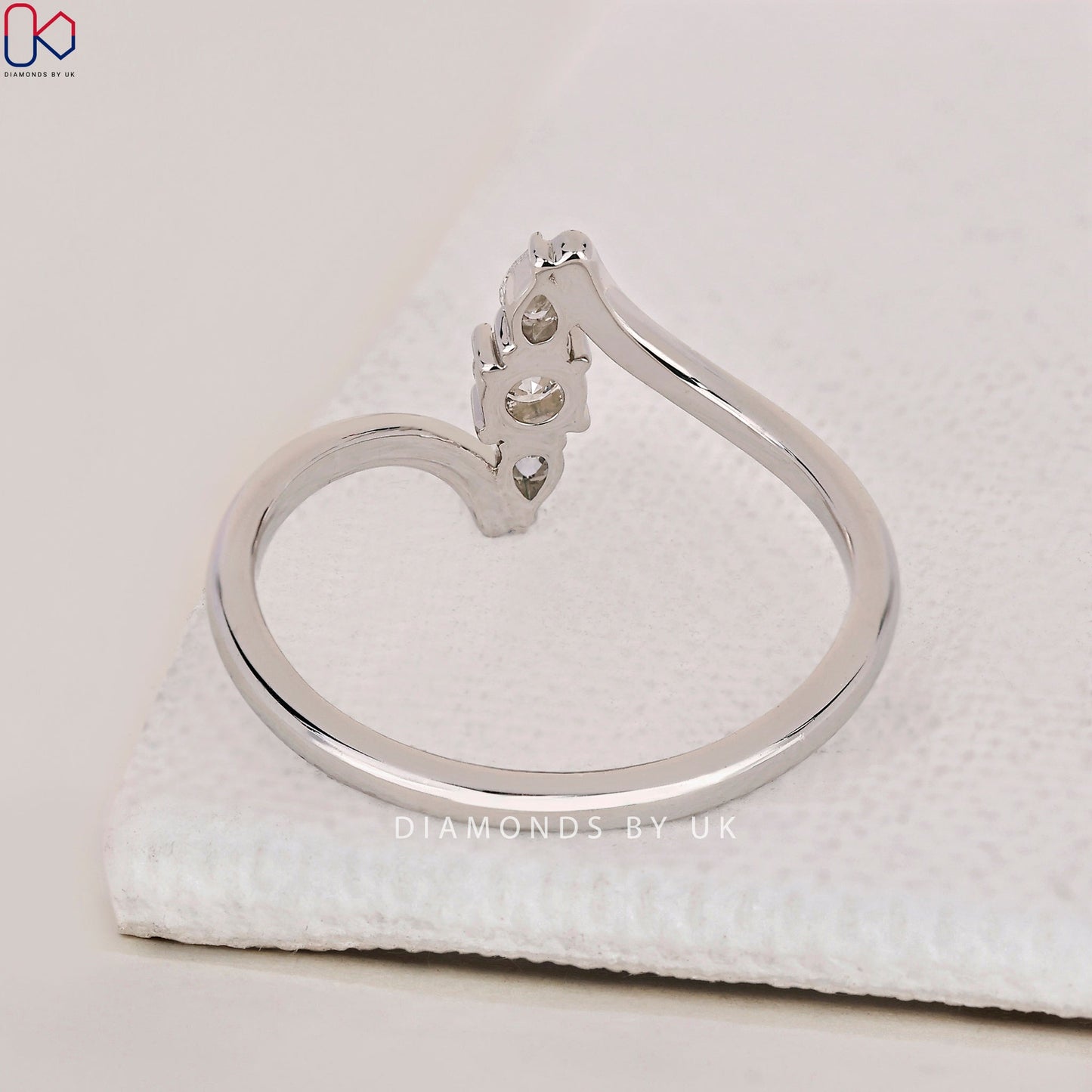 Round and Pear 3 Stone Diamond Ring