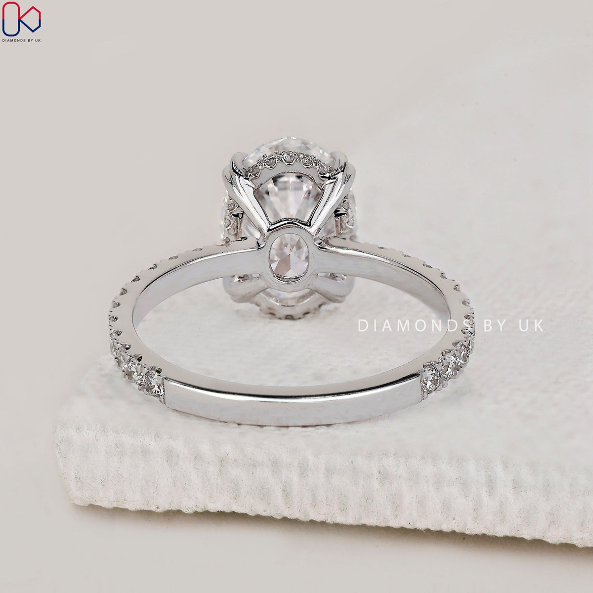 Oval Cut Diamond Ring In Pave Setting