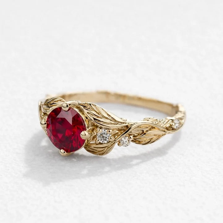 Rosalind’s Olive | Round Ruby Solitaire Ring with Olive Leaf Diamond Accents
